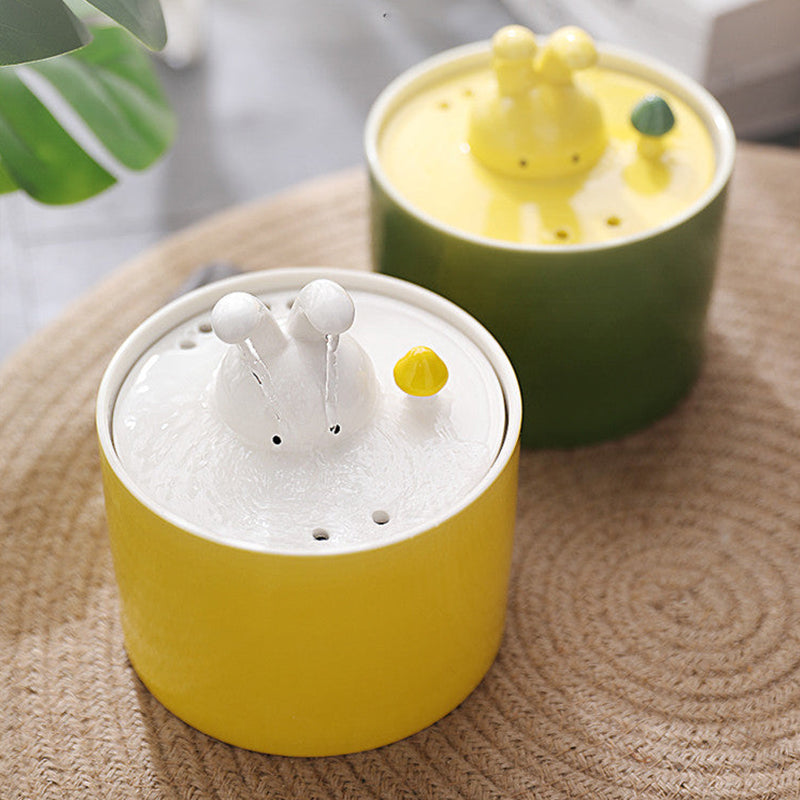 Stilren vattenautomat för en frisk och glad kanin